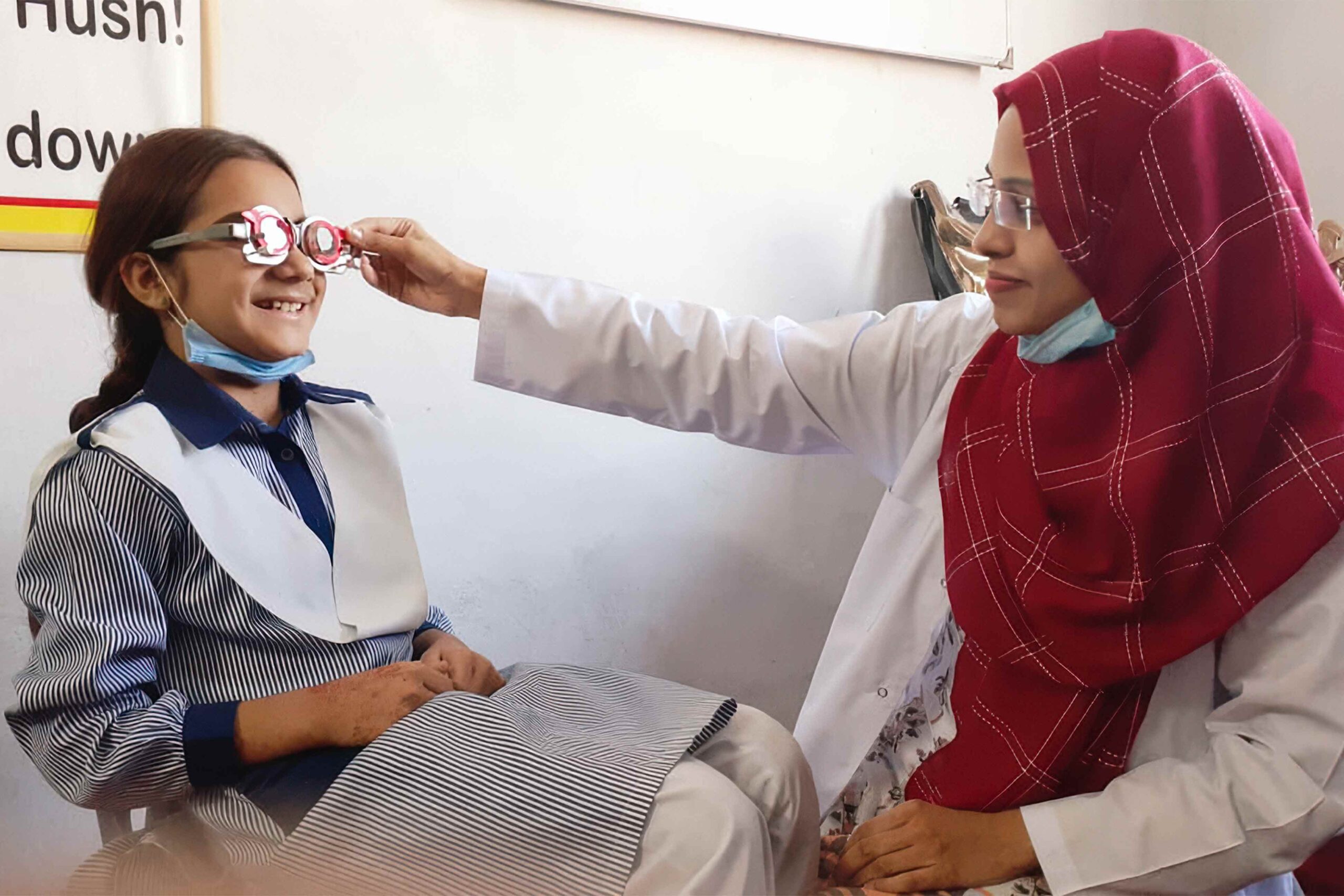 Children are eager to please and they may try too hard to give the ‘correct’ answers during refraction; this can result in an inaccurate spectacle prescription. PAKISTAN (Photo: Shaffaq Bajwa CC BY-NC-SA 4.0)