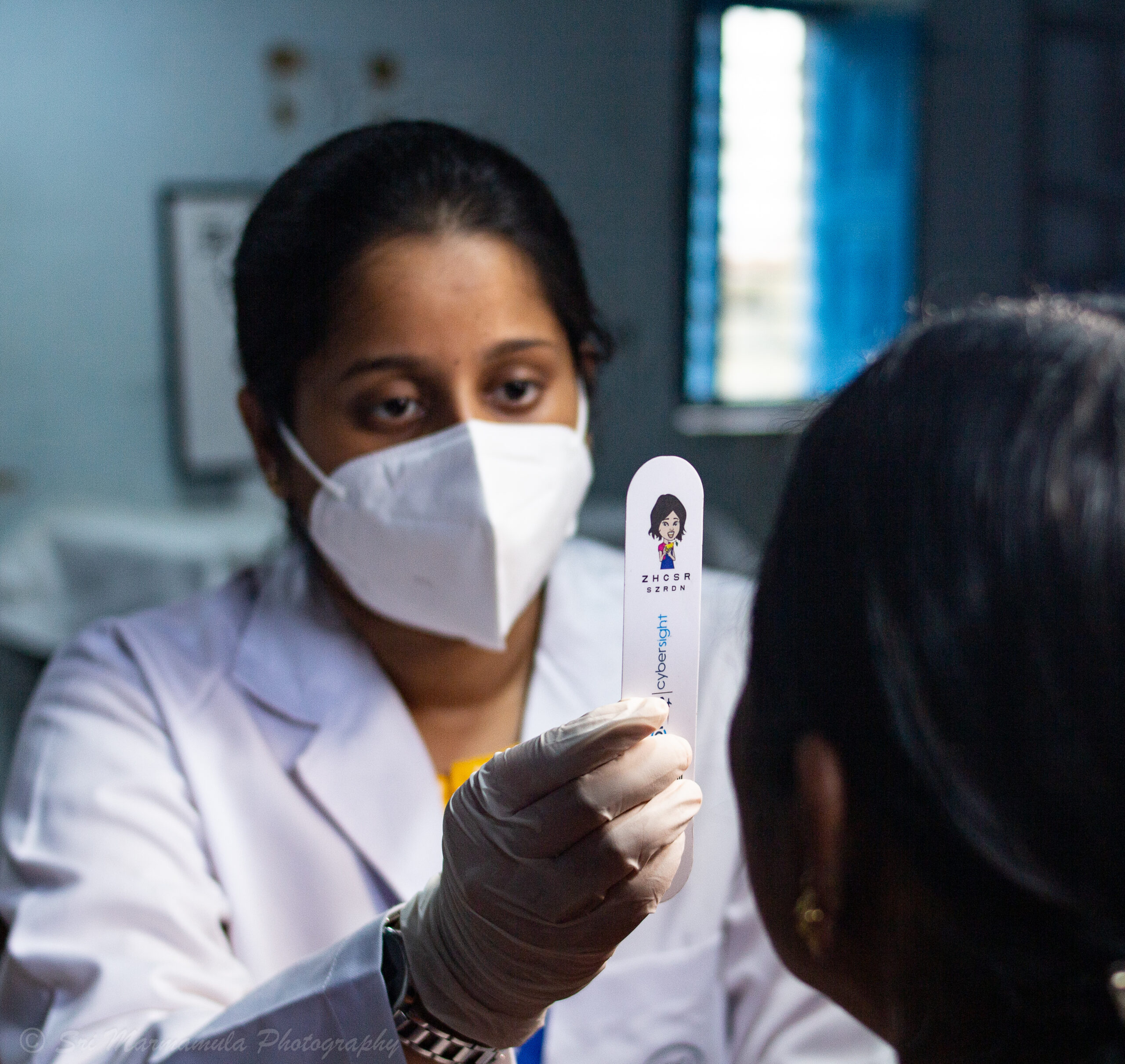 Figure 1 Assessing Binocular vision status. INDIA (Photo: © Srinivas Marmamula, LVPEI India CC BY-NC-SA 4.0)